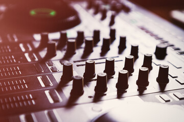 Dj sound mixer in night club