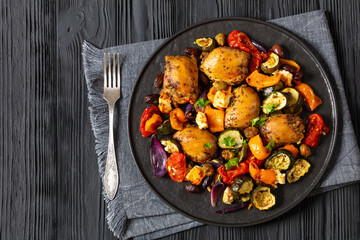 baked chicken thighs with veggies, olives, feta