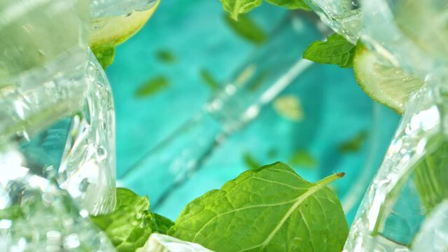 Super Slow Motion of Macro Shot of Pouring Mojito drink. Unique Perspective from inside of a Glass. Filmed on High Speed Cinema Camera, 1000 fps.