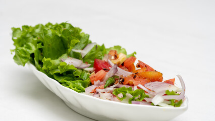 Fresh Salad Delight: Lettuce, Onion, and Tomato Ensemble