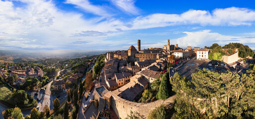 Italy. Volterra - scenic medieval town of Tuscany, Italian famous landmarks and heritage site. aerial drone panorama over sunset.. - 743785459