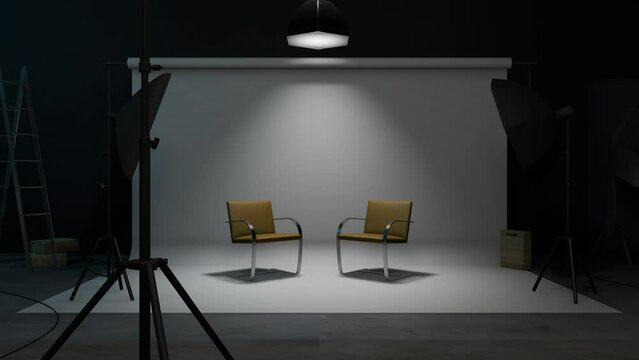 Turning lights on at empty recording studio with pair of chairs in center. Camera zoom