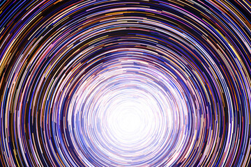 Neon circle lines with empty copy space isolated on black background. Colorful led lights long exposure rotation photo. Eco shiny light glow. Cosmos space planet abstraction. Purple vortex spiral.