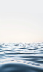Obraz premium Calm blue water surface with a simple and clean horizon.