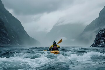 Man Kayaking Across Stormy Water in Norwegian Nature