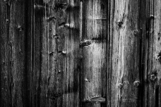 Black Wood Dark Texture. Black wood texture background coming from natural tree. Dark black Wooden textured surface. The texture of the old wooden fence in black and white image