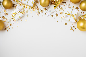Golden birthday party background with festive decoration from gift box, balloons, carnival hat,...