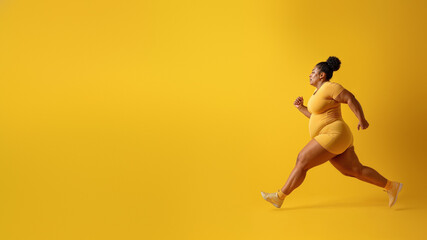 A vibrant woman gracefully dances towards physical fitness, her yellow footwear pounding against...