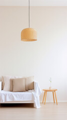 Minimalist living room interior with beige sofa, wicker lamp, and plant on a table. - obrazy, fototapety, plakaty