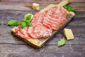 Slices Of  Traditional Italian  dried thinly sliced   artisan  pork salami Milano .Antipasti ...