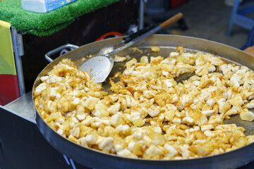 Frying Squid at a Street Food Stall