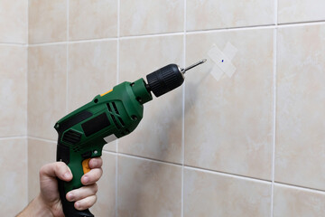 drilling tiles with a drill with a spear drill