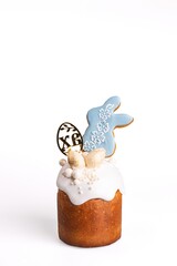 Traditional Easter Bread with Bunny Cookie Topper on White Background