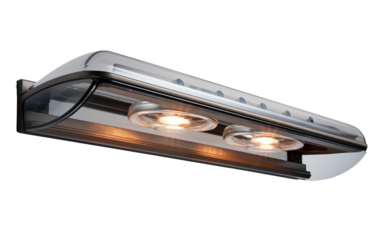 Close Up of a Light on a Wall. The close up shot shows a bright light fixture mounted on a wall, emitting a warm glow. The light casts a soft shadow against the surface, creating a subtle contrast.