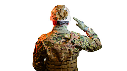 An American soldier salutes in a dramatic light