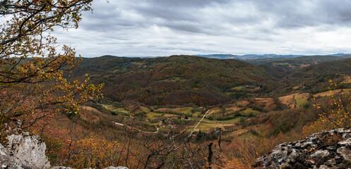 Panorama of the canyon with dense forest and meadows around village, Stapari, near Uzice Serbia