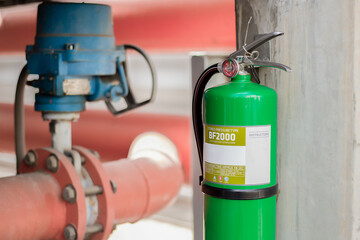 Naklejka premium green tank of fire extinguisher