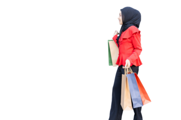 happy muslim arab lady happy enjoy shop in shopping walking street hand holding many paper shopping bag