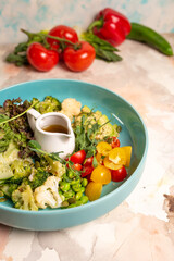 A Balanced Diet Plate With Vegetables, Salad And Dressing. Salad Bowl.
