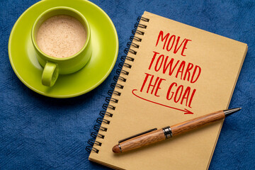 move toward the goal - motivational reminder in a spiral notebook,  progress or take action concept - obrazy, fototapety, plakaty