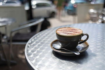 Cup of tasty coffee in cafe