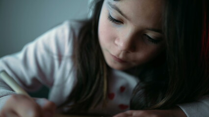 Creative Little Girl Concentrated on Drawing at Home, Artistic Engagement