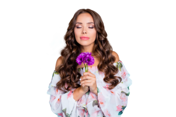 Close up portrait of charming, lovely, sweet, gorgeous, adorable, good-looking woman hold small purple bouquet of flowers in hand and breathe in their smell isolated on bright turquoise background