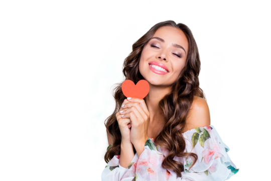 Close up portrait of nice, cute, lovely woman hold one small paper card in hands isolated on shine turquoise background with copy space for text