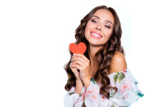 Close up portrait of gorgeous, adorable, good-looking curly brunette look at camera with hollywood smile, hold small paper card in hands isolated on bright teal background with copy space for text