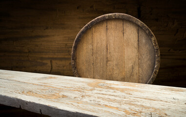 Oktoberfest beer barrel and beer glasses with wheat and hops on wooden table. High quality photo
