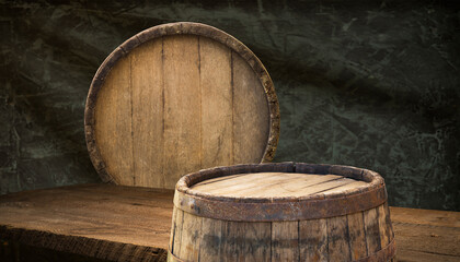 Oktoberfest beer barrel and beer glasses with wheat and hops on wooden table. High quality photo