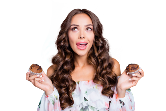Close up portrait of beautiful, attractive, pretty, dreamy, charming curly lady people, person look aside hold muffins in hands isolated on shine teal background - Powered by Adobe