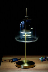 An interesting designer lamp on a golden base with thick glass. English style. Classic interior - 743937877
