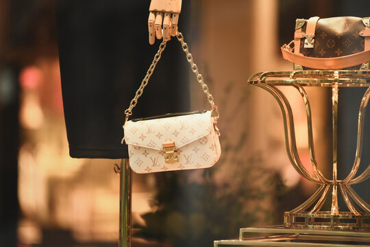 LILLE, FRANCE - FEBRUARY 21,2024 : Bag Louis Vuitton in the shop window at store.