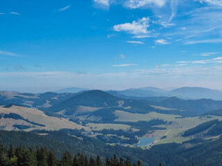 On top of majestic mountain peak Hochlantsch with panoramic view of lake at Teichalm, Graz...