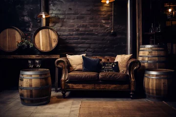 Fotobehang A leather couch and wine barrels in a dark cellar with brick walls and dim lighting. © zhor