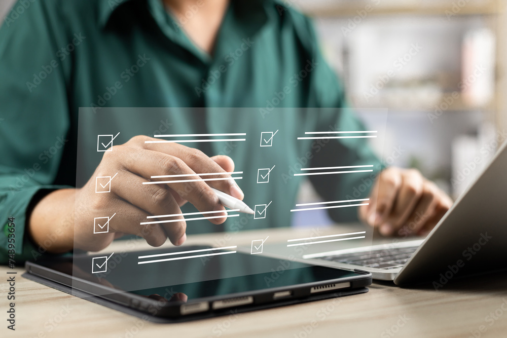 Canvas Prints digital business performance monitoring survey filling with tablet and laptop, businessman enhancing
