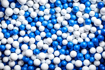 White and blue plastic balls selected for a ball pit