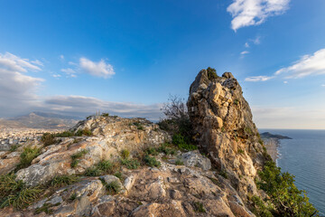 Panoramic view of the countryside and the Mediterranean coast, view from the mountain to a landscape with clouds and sea.