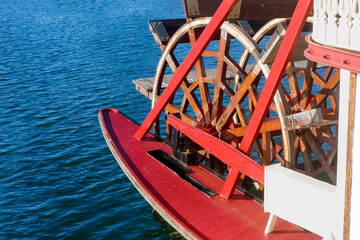 Closeup of wooden floats in a paddle wheel of vintage recreational steamer