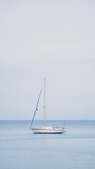 sailboat on the sea on a cloudy day