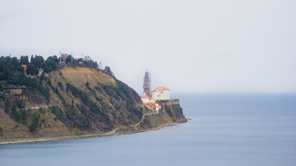 Church of Piran, Slovenia, on the edge of a cliff on a cloudy day