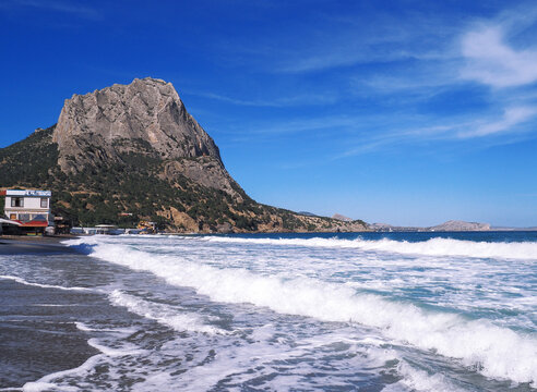 Beautiful landscape seacost with rocks at the sunny day new world long exposure