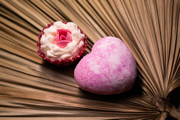 pink rose on wooden background