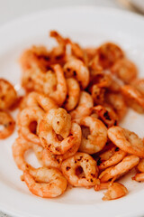 Delicious shrimp and mussels. Seafood on a white plate