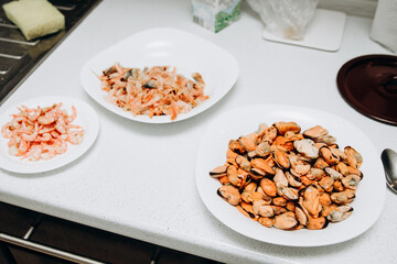 Delicious shrimp and mussels. Seafood on a white plate