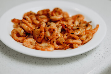 Delicious shrimp and mussels. Seafood on a white plate