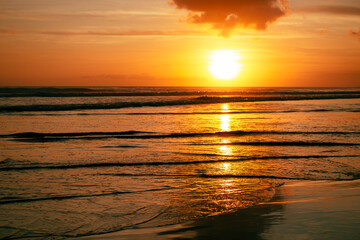 Fototapeta na wymiar Golden sunset on the beach in Bali