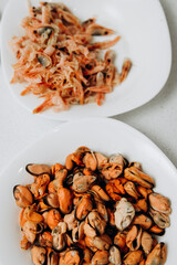 Delicious shrimp and mussels. Seafood on a white plate