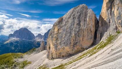 a giant rock with dinosaurs footprints at the foot of mount pelmo in the dolomites dating back 200...